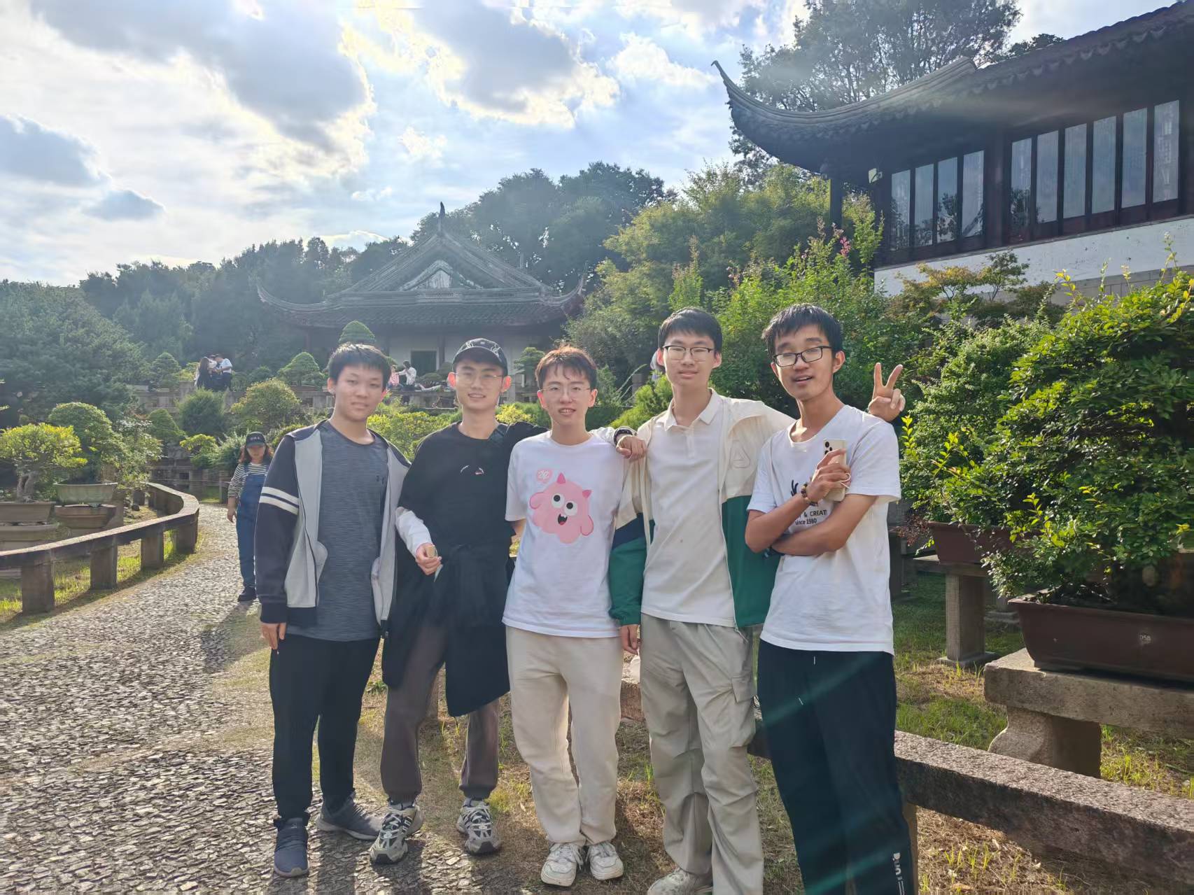 From left to right, XM Wang, SJ Luan, JZ Zhou, RT Luo, and KR Lv in a Suzhou garden